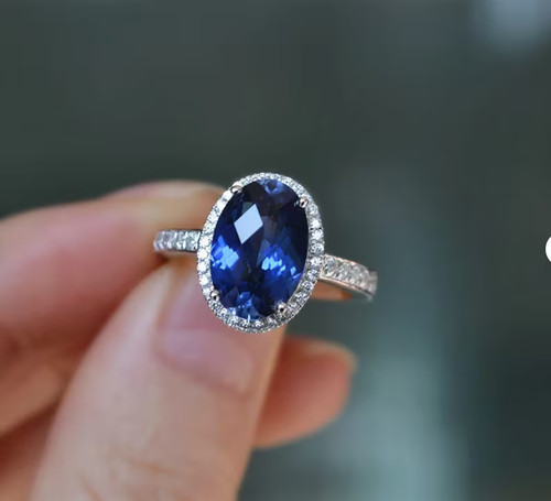 90ct oval cut - 5.90ct, blue
