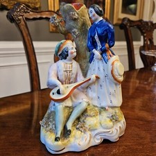 7 3/4” Staffordshire figure
