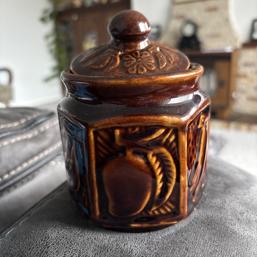 Vintage brown ceramic jar with - vintage,