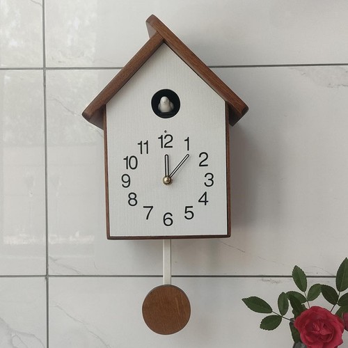 Chiming cuckoo clock with - chiming,