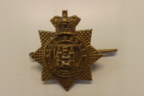 Military cap badge the east - the,