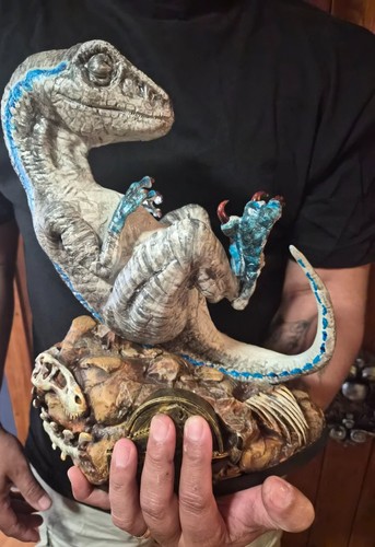 Blue baby dinosaur sculpture - dinosaur,