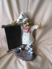 Peter Mook Italian chef restaurant statue holding menu chalk board