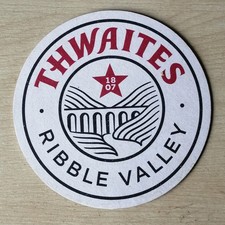 THWAITES BREWERY BEER MAT.  BLACKBURN BREWERY. 4 INCH APPROX. FREEPOST 