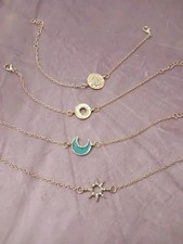 Set Of 4 Gold Colour Zircon Bracelets Sun, Moon, Discs