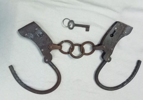 Old handcuffs iron adjustable - handcuffs,