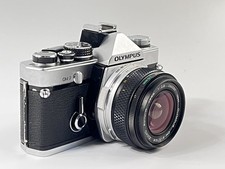 Olympus OM-2n MD 35mm SLR Film Camera with 28mm f2.8 Zuiko Lens