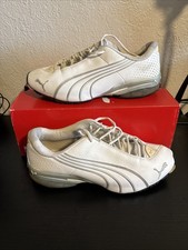 pair of white and silver Puma