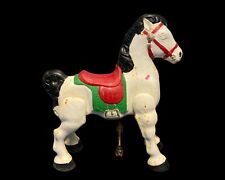 A vintage Mobo painted mechanical ride on horse. 