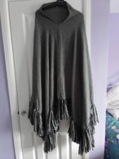 PONCHO/GREY AND BLACK FRINGE /LOOKS BETTER IN PERSON SOFT AND WARM/NEVER WORN 