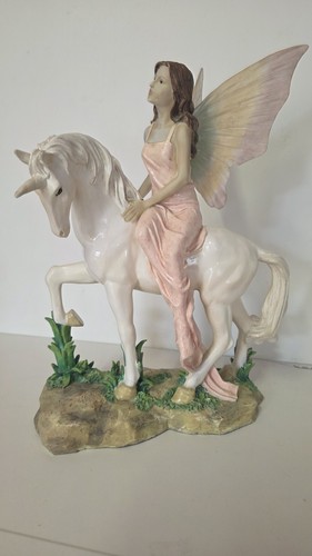 Vintage fairy riding unicorn - riding,