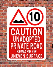 CAUTION UNADOPTED PRIVATE ROAD