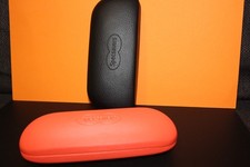 Two specsavers glasses cases