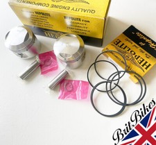 PAIR OF HEPOLITE PISTONS &