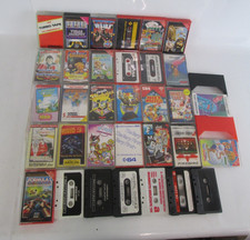 Job Lot Bundle Of 33 Vintage Commodore 64 Game Tapes In Black Leather Case