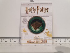 (lot 655) Harry Potter Wizarding World Medal  ~ Monster Book of Monsters ~