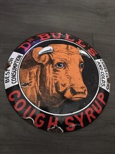 Dr Bull’s Cough Syrup, Enamel Sign , Man, Cave, Garage Automobilia 12” Sign