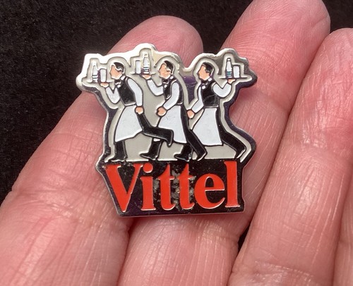 Vittel bottled water waiters - water,