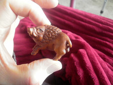 Hand Carved wood netsuke Wild