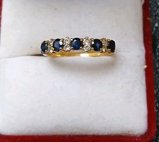 18 Carat Gold Diamond And Sapphire  Ring. 2.15g