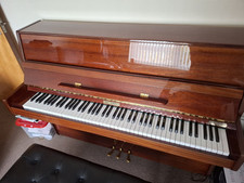 Modern RITMULLER Piano And Stool In Pristine Condition