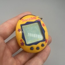 Tamagotchi Connection v2 Yellow with Stars Bandai 2004 - Working