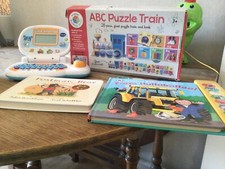 Toddler books, abc train jigsaw, and little smartop 