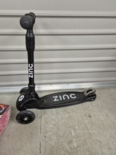 Zinc Three Wheeled Folding Motion Scooter - Used