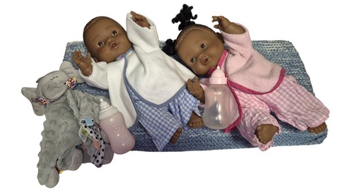 Twin dolls boy and - , with