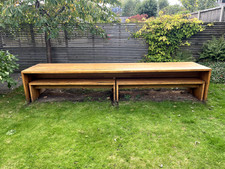 Solid oak garden dining table and 4 benches. Table needs a bit of TLC