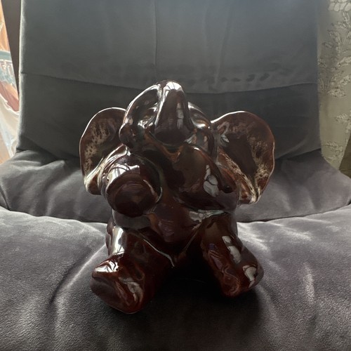 Brown pottery elephant money - pottery,