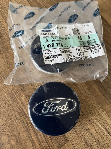 Genuine ford center caps - center,