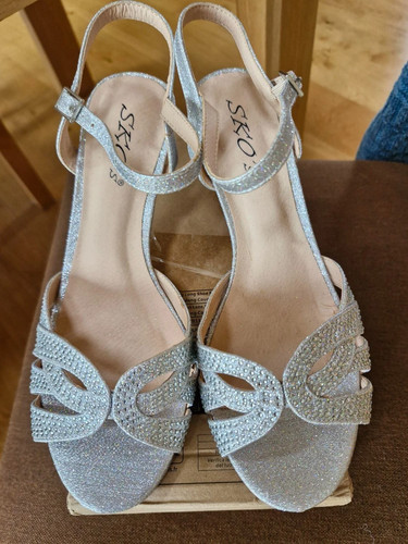 New sparkly silver - strappy, mid
