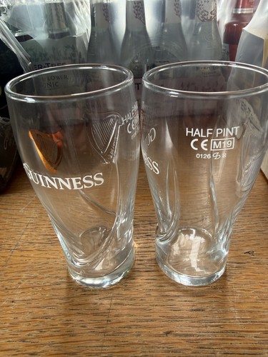 Pair guinness half pint - of,
