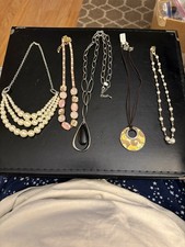 Five unbranded costume jewelry