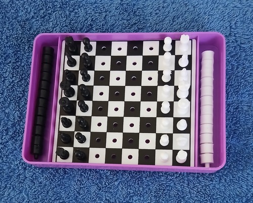 Travelling chess and draughts - and,