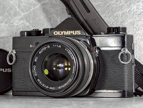 Exc read olympus - olympus, om-1n