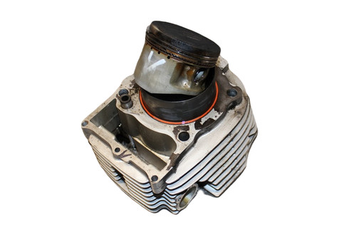 Cylinder piston - +, (front)