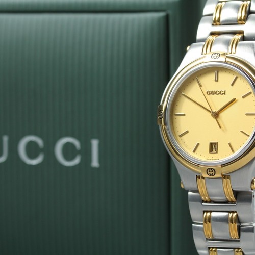 Near mint gucci 9040m gold - mint,