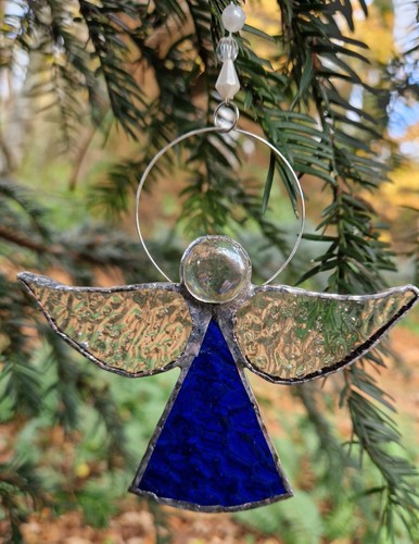 Blue stained glass - , angel