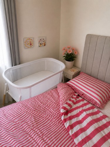 Nested glide bedside crib - n,