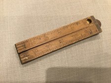 Antique vintage wooden and brass foldable ruler measure 23 inches