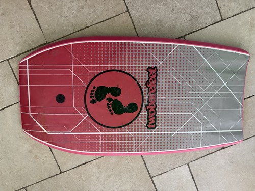 Two bare feet body - two, board