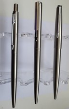 Parker Trio of chrome Ballpoint Pens . 45,insignia +arrow