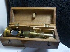 Vintage small old brass drum microscope in a nice fitted box 