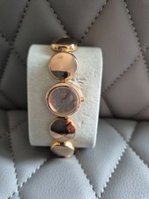 Ladies DKNY watch. Rose gold metal strap and case with matching face.   