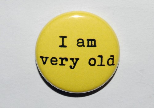 Very old button - i, badge