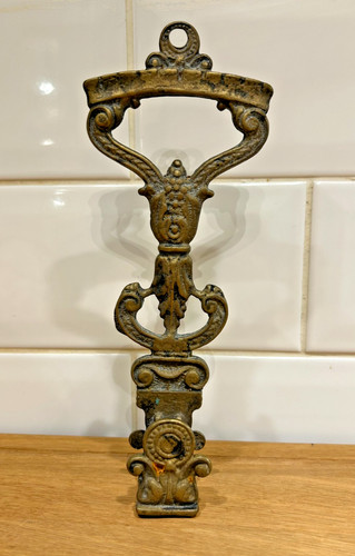Antique brass wall match