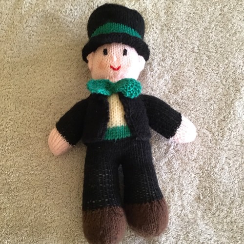 Hand knitted leprechaun mascot - hand,