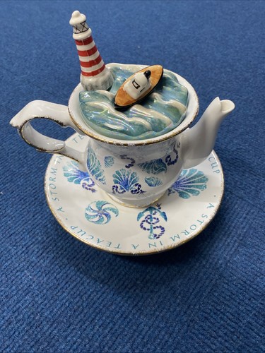 Storm teacup lighthouse - a,